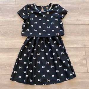 TOTAL GIRL SIZE 12 BLACK DRESS WITH BOWS AND SEQUIN NECKLINE
